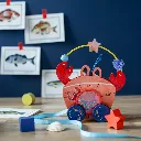 jouet-tirer-bois-crabe-moulin-roty.webp